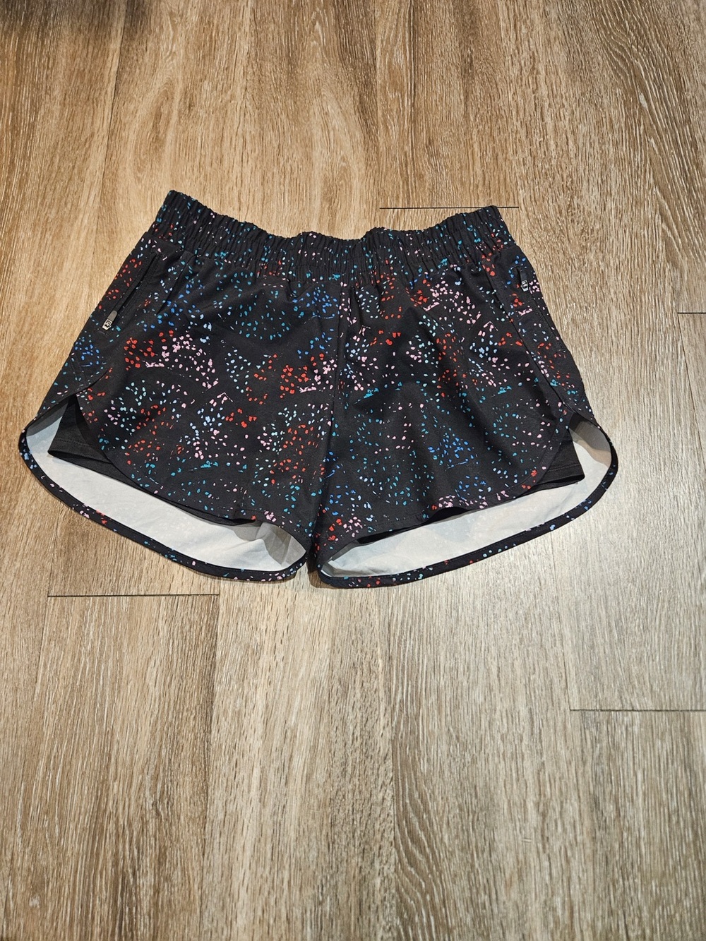 Avia Black Athletic Shorts with Red, Blue, and Pink Speckle Print